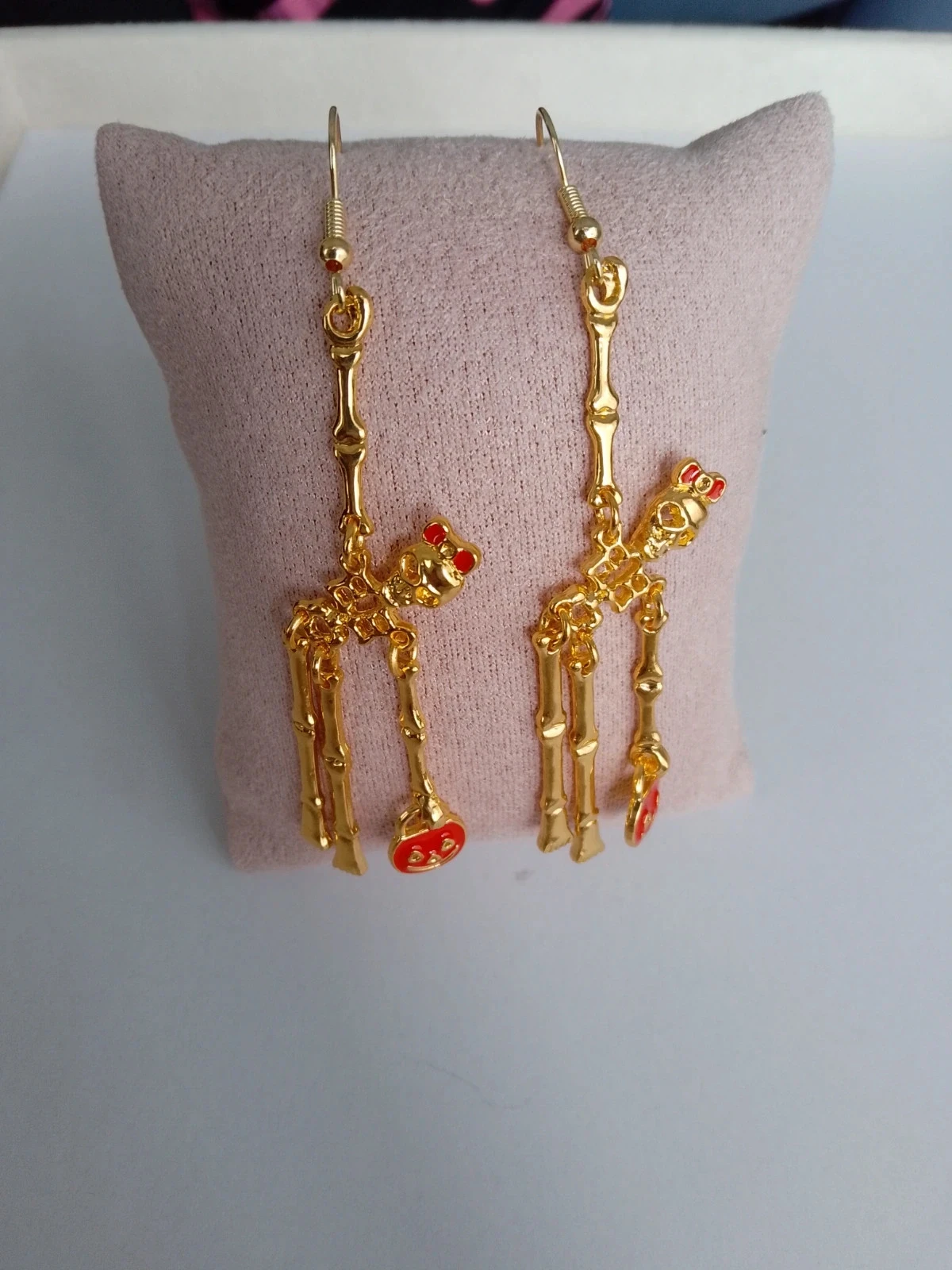 Boucles d'oreilles squelettes dores